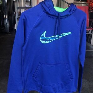 Nike blue sweatshirt with a lime green logo